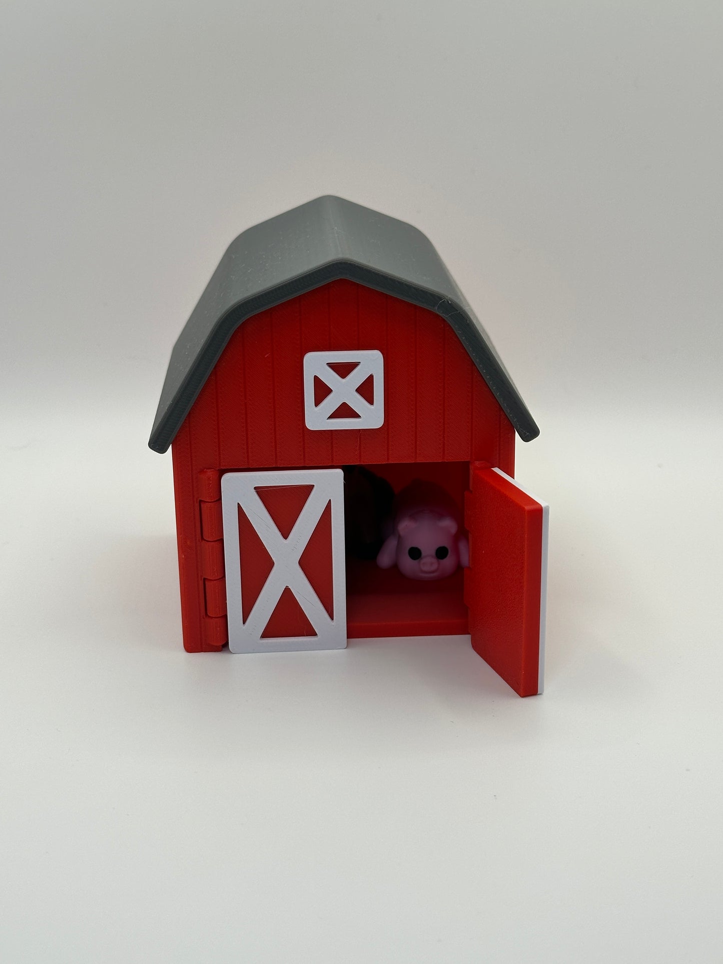 Red Barn with revolving doors with 5 mystery farm animals